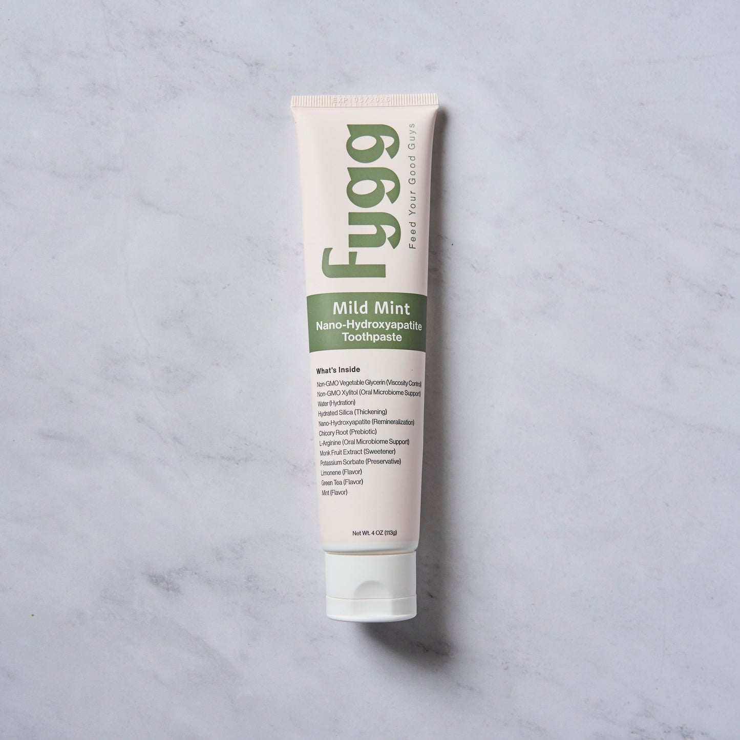 
                  
                    Fygg Nano-Hydroxyapatite fluoride free Toothpaste in Mild Mint on Marble Background
                  
                